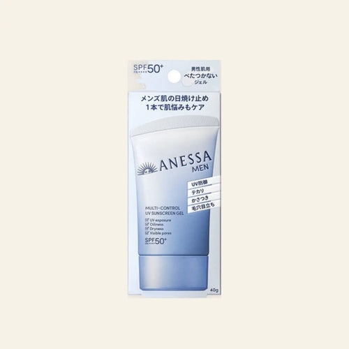 Anessa Perfect UV Sunscreen Men SPF 50+ on a warm ivory background