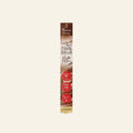 CANMAKE Creamy Touch Liner 02 Medium Brown on a warm ivory background