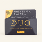 DUO The Cleansing Balm Black Repair EX 66g on a warm ivory background