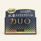 DUO The Cleansing Balm Scrub Black 66g on a warm ivory background