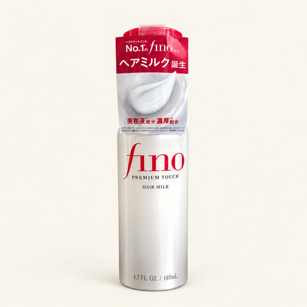 Fino Premium Touch Hair Milk 140ml on a warm ivory background