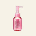 MA CHÉRIE Hair Oil EX f 60ml on a warm ivory background
